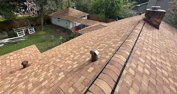 Driftwood laminate roof on a one-story Houston home in 77066