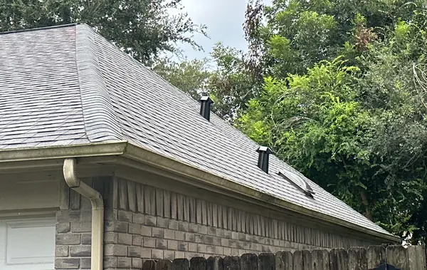Ridge vent on a steep 9/12 roof in Sugar Land 77479