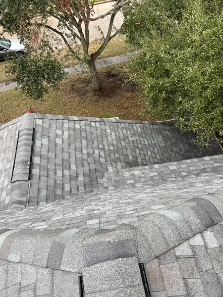 Gray laminate roof on a two-story First Colony home in Sugar Land 77478