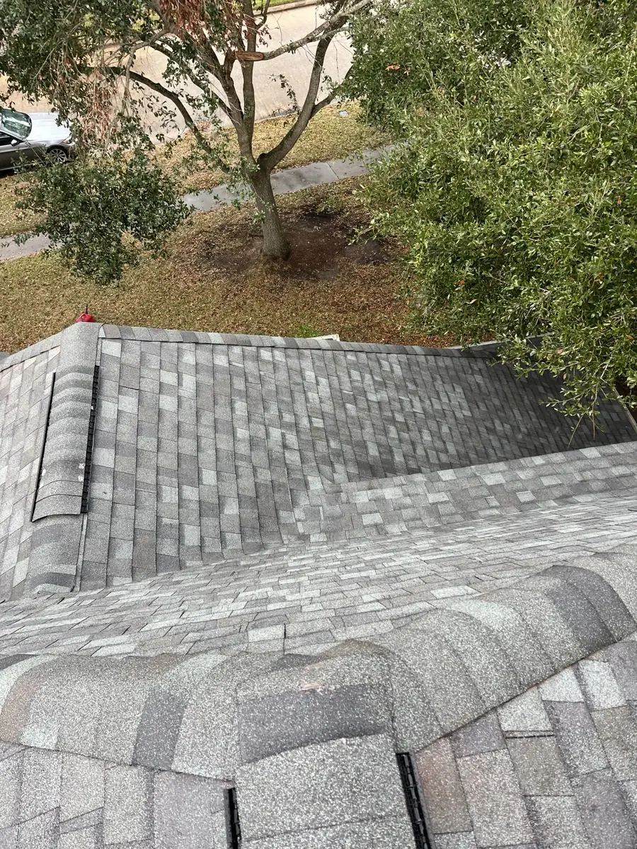 Gray laminate roof on a two-story First Colony home in Sugar Land 77478