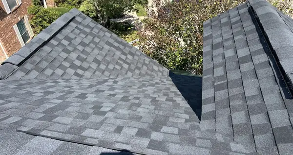 Front of a two-story Pearland home after roof replacement