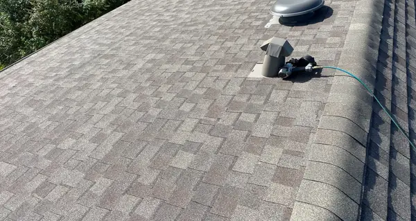 New pipe jack and ridge caps on the main slope