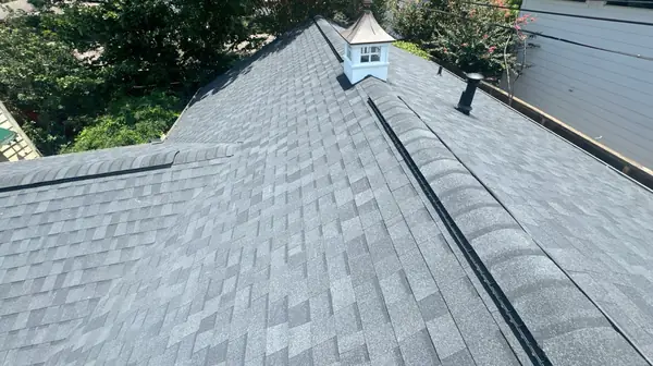 Ridge vent run on a July 2024 roof replacement in Houston