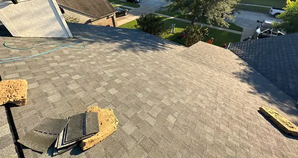 Rear slope of a replaced roof with new shingles in northwest Houston