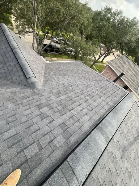 New shingles and ridge on a September 2025 roof replacement in Houston