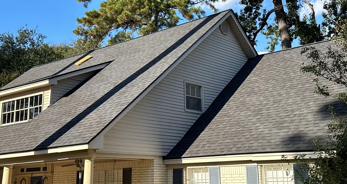 Front shed dormers and skylight on a north Houston roof replacement