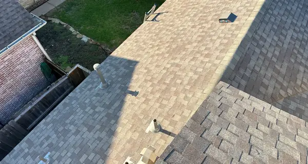 Ridge line of the completed roof above the back yard