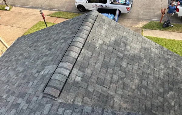 Front gable with blue-gray shingles in Houston, TX