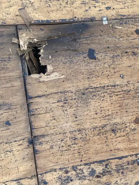 Ridge of a replaced townhome roof in Alief, Houston