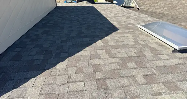 Parapet flashing on a new townhome roof in Houston