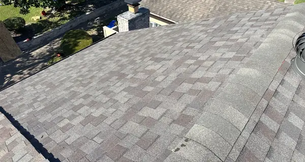 Gray laminate roof on a townhome in Houston 77099