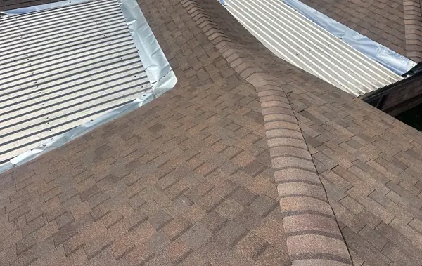 Hip and ridge during installation on a southeast Houston home