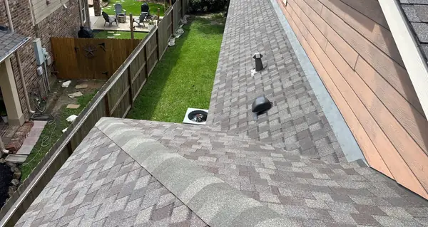 Side slope of a windstorm-nailed roof in League City
