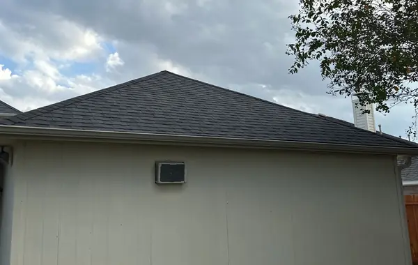Side elevation with siding under the new roof