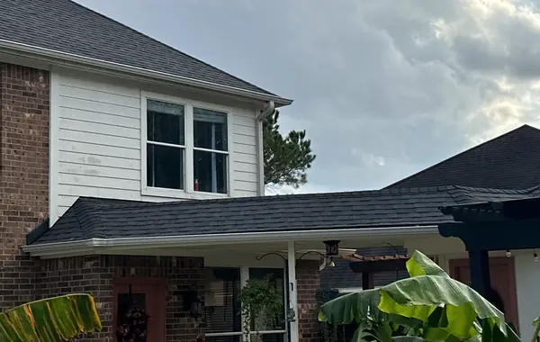 Rear of the house with the re-roofed patio cover