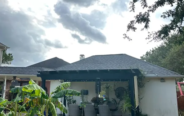 Patio cover roof tied into the main slope