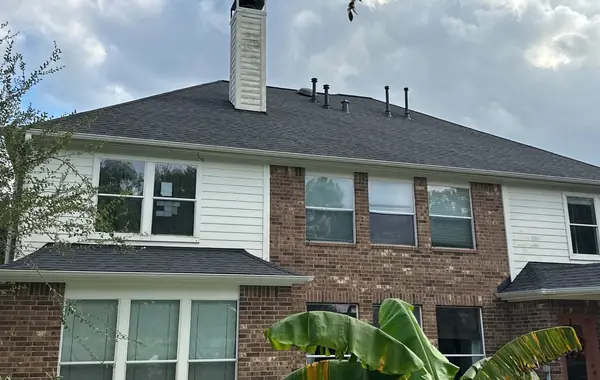 Rear elevation with the chimney and completed roof