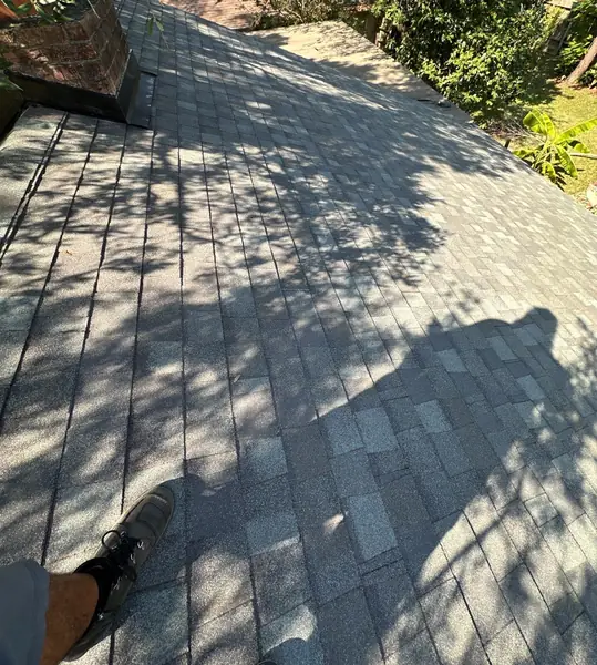 Chimney step flashing on a new Friendswood, TX roof