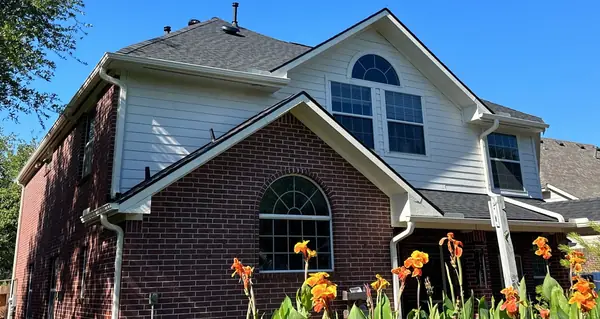 Front gable with fresh charcoal laminate shingles in Houston, TX