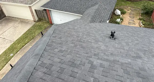Garage gable with fresh shingles in northwest Houston