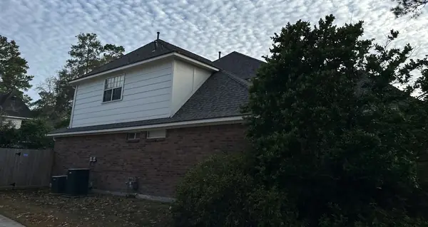 Rear of a Kingwood home after a February 2024 roof replacement