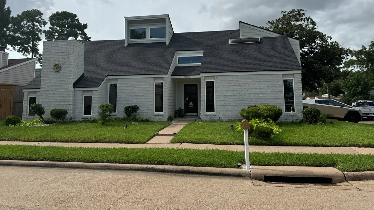 Driftwood laminate roof on a one-story Houston home in 77091
