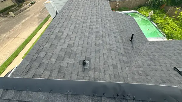 Rear slope of a replaced roof over new decking in Houston