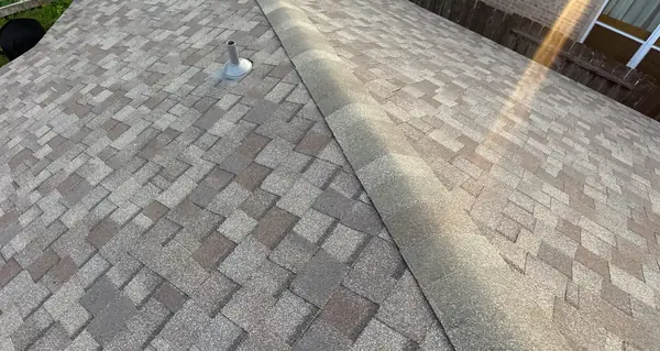 Fresh ridge line and slope on a new shingle roof in Houston, TX