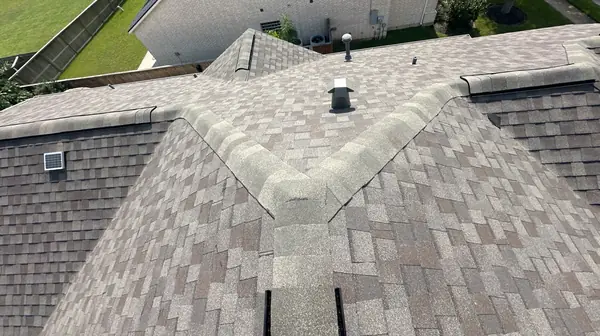 Side slope of a replaced two-story roof in Pearland