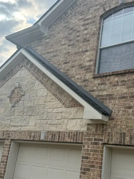 Hip ridge of a June 2026 roof replacement in Pearland
