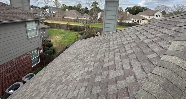 Hip ridge of a February 2025 roof replacement in northwest Houston