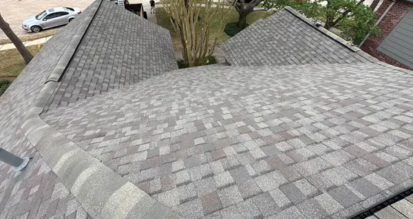 Brick chimney re-flashed on a new Houston roof