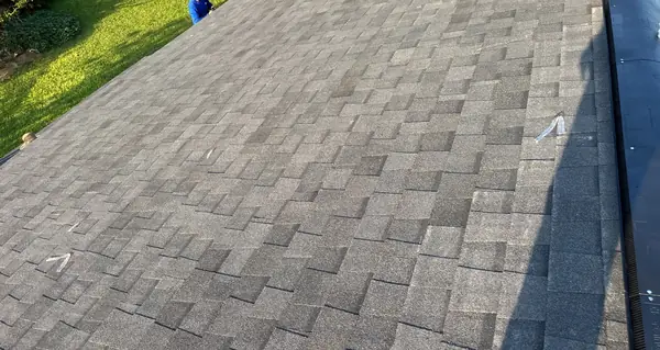 Moire Black laminate roof on a one-story Houston home in 77083