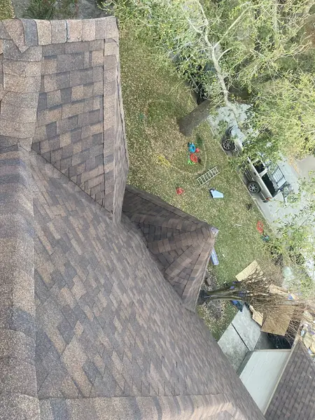 Valley and ridge detail on a steep Houston roof
