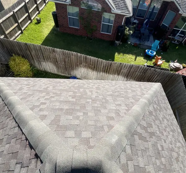 Hip ridge of a replaced roof in Pearland, TX