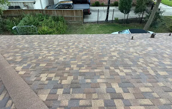 Rear slope of a new shingle roof in Memorial, Houston