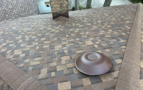 Ridge cap and valley detail on a Houston roof