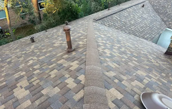 Charcoal laminate roof with dormers on a Memorial-area Houston home in 77079