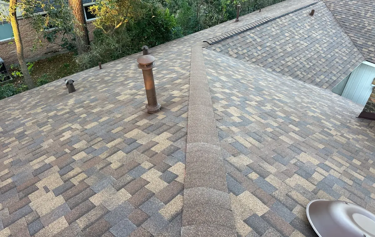 Charcoal laminate roof with dormers on a Memorial-area Houston home in 77079
