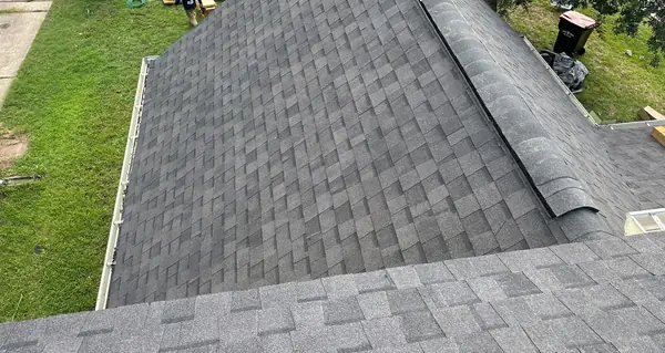 Re-laid laminate roof with ridge vent on a two-story Houston home in 77073