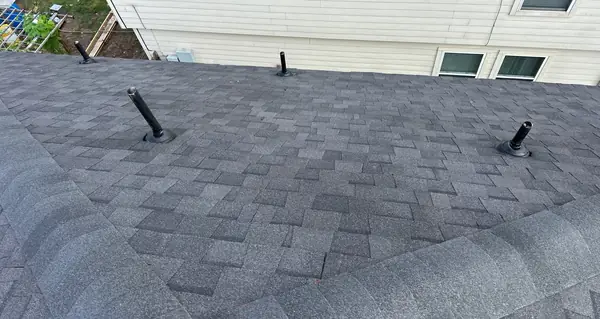 Steep 10/12 front slope with fresh shingles in north Houston