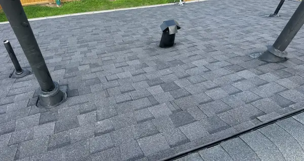 Four-way vent and pipe jacks on a Houston roof