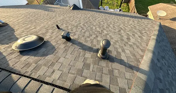 Shingle field with new dome vent and pipe jacks
