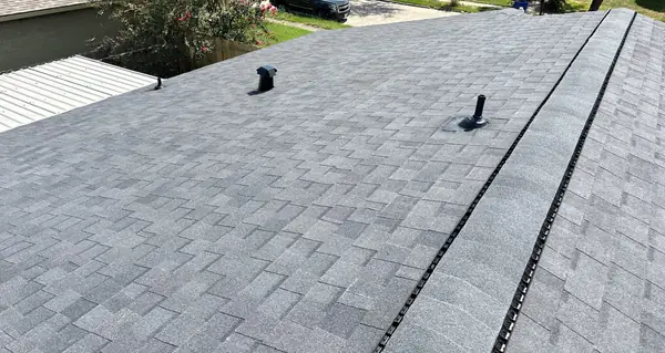 Gray laminate roof on a one-story Houston home in 77049