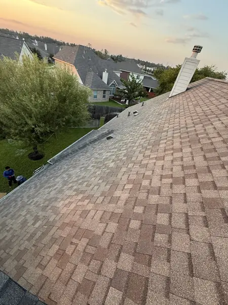 Chimney with new flashing on the completed roof, Tomball 77375