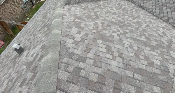 Front hips and ridge caps on the completed roof