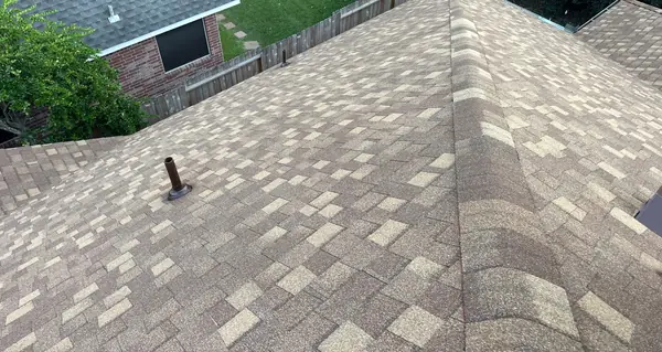 Driftwood laminate roof on a two-story home near Lake Houston in 77044