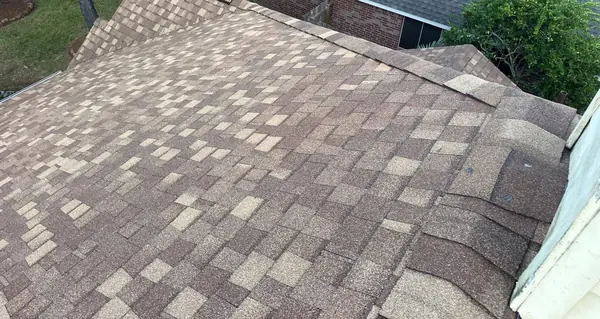 Brick chimney re-flashed on a new Houston roof